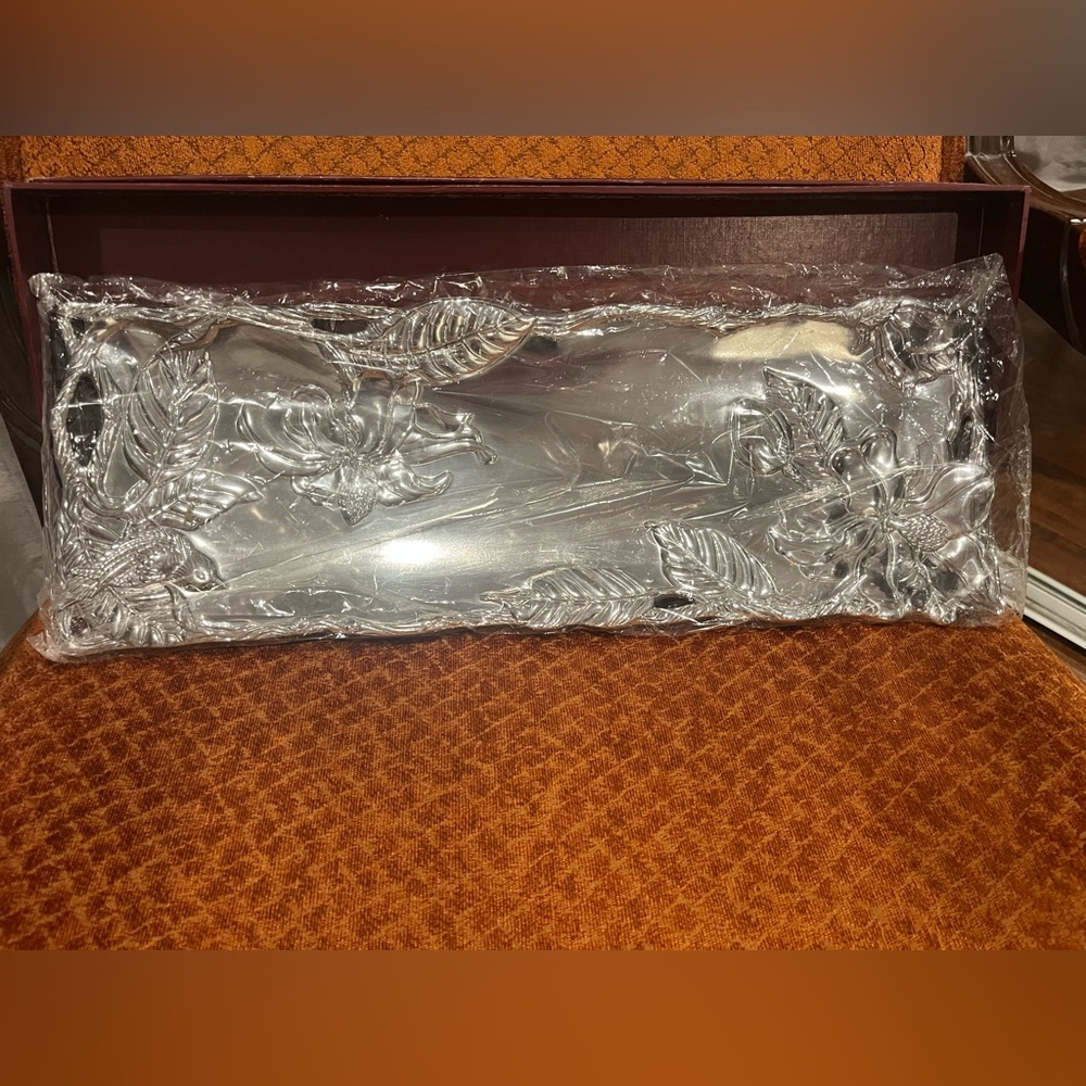 Brand new in its original box oblong magnolia style Arthur court tray .